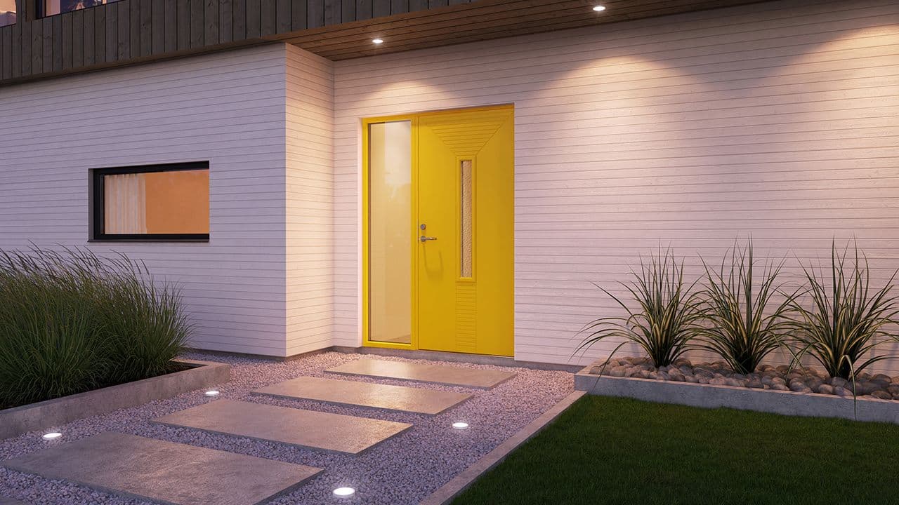 Moderne funkisvilla med gul ytterdør.